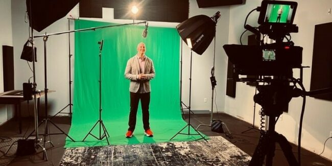 Ian McGriff at Josh Robinsons Studio standing in front of a greenscreen